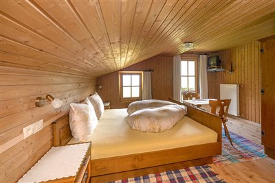 Bedroom of the attic flat of the Waldsamerhof